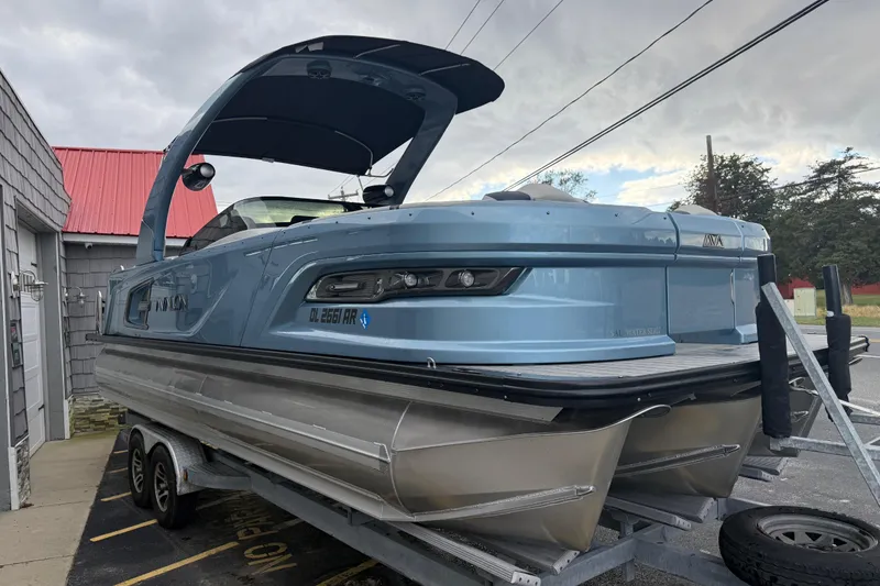 Slide: The Image of 2026 Avalon 2585 Excalibur Tri-toon with Mercury 400hp V-10 engine, rear view. - 8