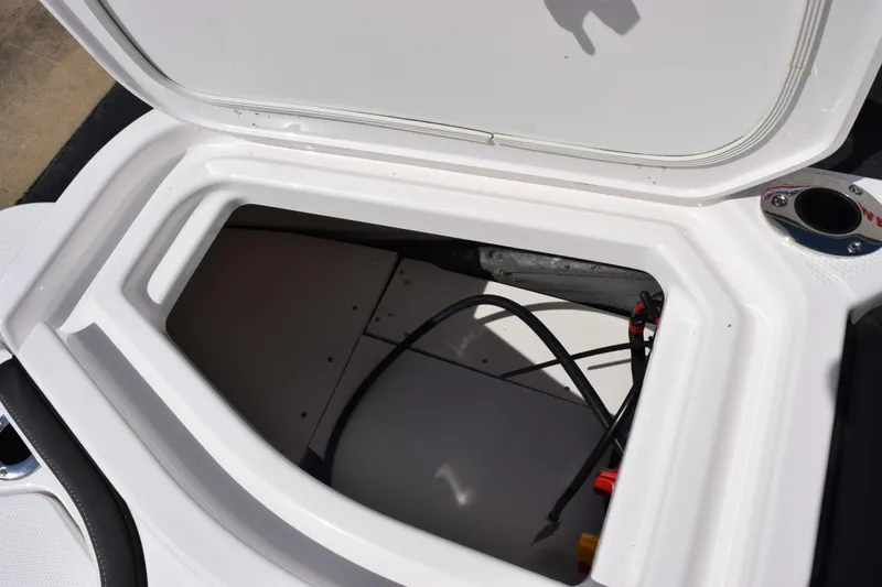 Slide: The Image of Open storage compartment on 2026 Yamaha Boats 255 FSH Sport H. - 26