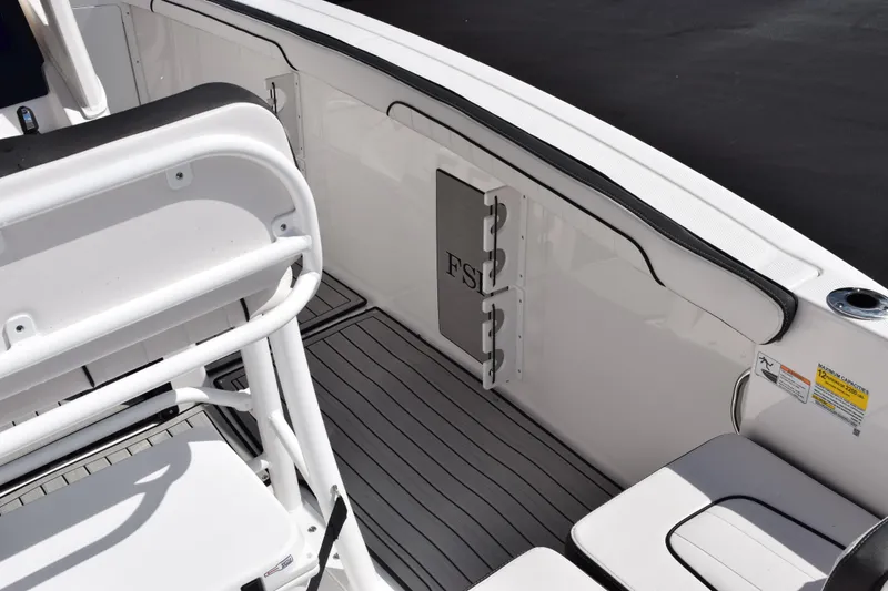 Slide: The Image of Interior view of 2026 Yamaha Boats 255 FSH Sport H, featuring seating and deck details. - 8