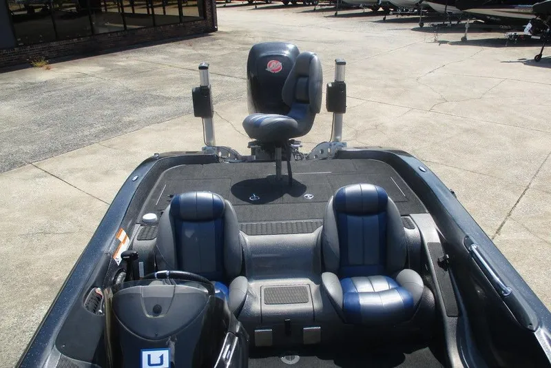 Slide: The Image of 2016 Stratos 201 XL Evolution boat dashboard with Garmin GPS and Minn Kota trolling motor. - 2