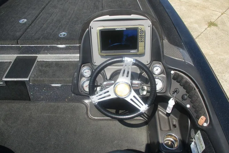 Slide: The Image of Steering console of a 2016 Stratos 201 XL Evolution boat with Lowrance display. - 6