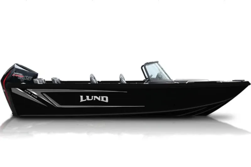 Slide: The Image of 2026 Lund 1975 Tyee boat on trailer in showroom, black exterior. - 1