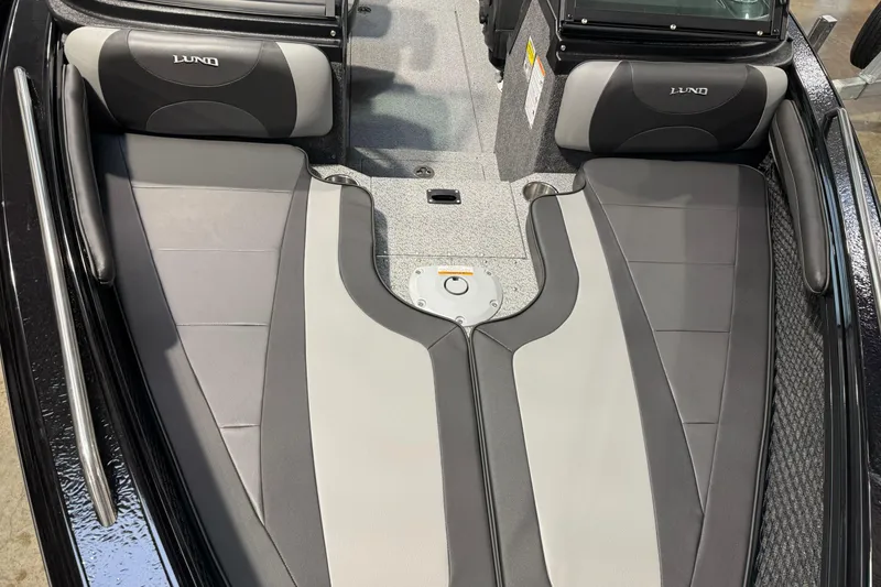 Slide: The Image of Interior of 2026 Lund 1975 Tyee boat with sleek seating and modern design. - 11