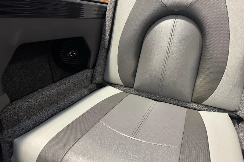 Slide: The Image of Gray and white seat in 2026 Lund 1975 Tyee boat interior. - 26