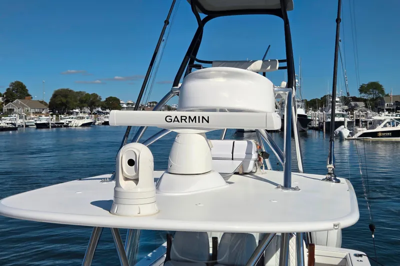 Slide: The Image of 2024 Valhalla Boatworks V-41 with Garmin equipment, docked in a marina. - 10