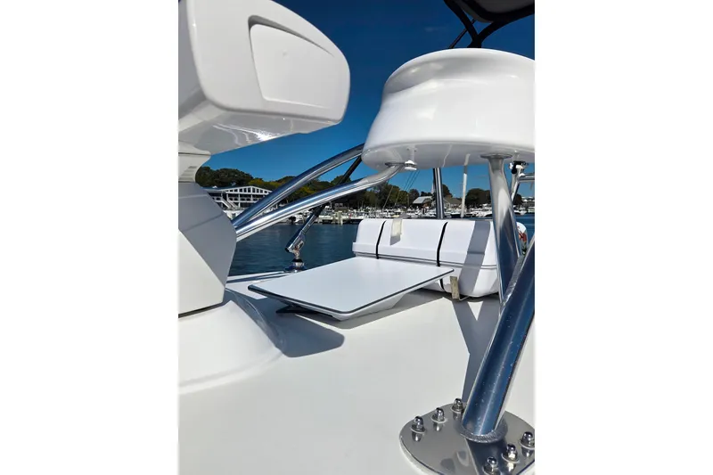 Slide: The Image of 2024 Valhalla Boatworks V-41, sleek design with modern seating and chrome accents. - 11