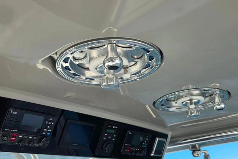 Slide: The Image of 2024 Valhalla Boatworks V-41 helm with advanced controls and navigation equipment. - 13