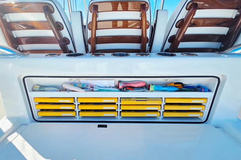 Slide: The Image of 2024 Valhalla Boatworks V-41 fishing tackle storage with lures and yellow drawers. - 19
