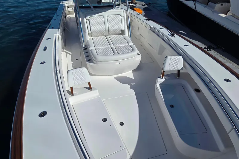 Slide: The Image of 2024 Valhalla Boatworks V-41, spacious deck with luxurious seating and sleek design. - 21