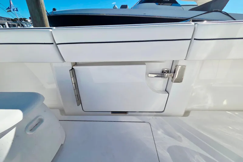 Slide: The Image of 2024 Valhalla Boatworks V-41, featuring sleek white deck and stainless steel hardware. - 25