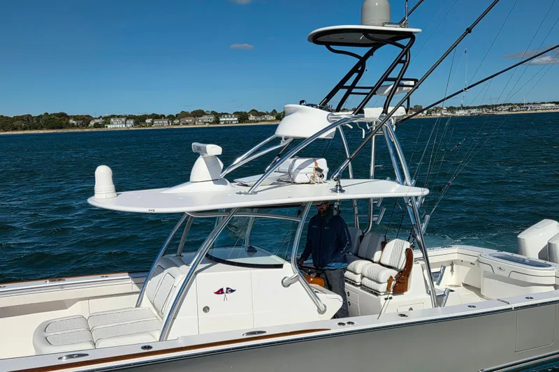 Slide: The Image of 2025 Valhalla Boatworks V-41 on water, featuring sleek design and advanced navigation equipment. - 3