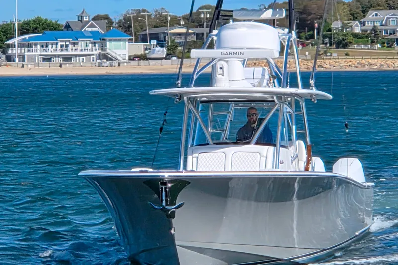 Slide: The Image of 2025 Valhalla Boatworks V-41 cruising near coastal buildings. - 5