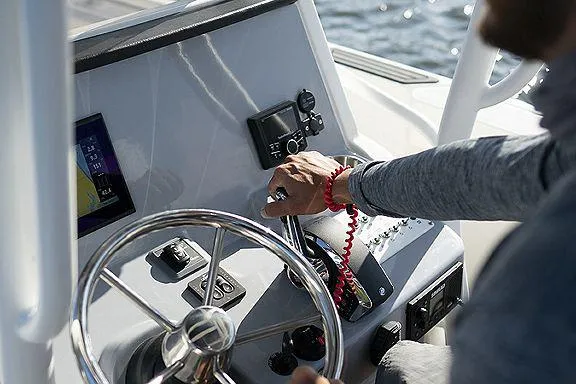 Slide: The Image of 2023 Bayliner Trophy T24CC boat interior with open storage compartment. - 5