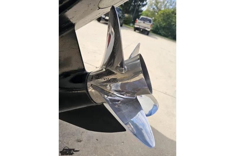 Slide: The Image of Close-up of a shiny propeller on a 2007 Baja 26 Outlaw boat. - 34