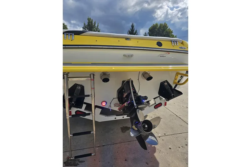 Slide: The Image of 2007 Baja 26 Outlaw boat rear view with propeller and ladder. - 39