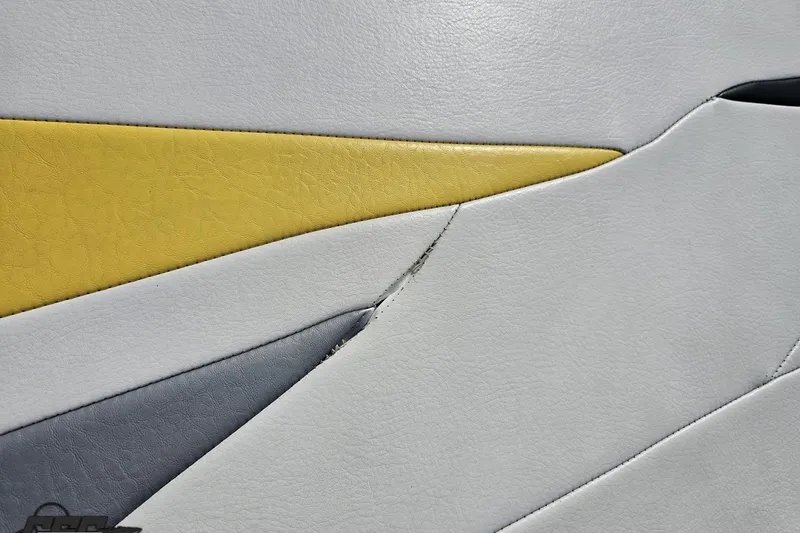 Slide: The Image of Close-up of 2007 Baja 26 Outlaw boat upholstery with yellow and gray accents. - 45