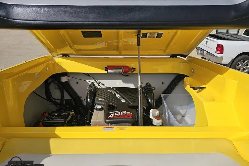 Slide: The Image of 2007 Baja 26 Outlaw engine compartment with MerCruiser 496 MAG HO engine, yellow interior. - 95