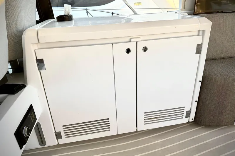 Slide: The Image of 2019 Azimut Atlantis 51 yacht interior with white cabinet and modern design. - 14