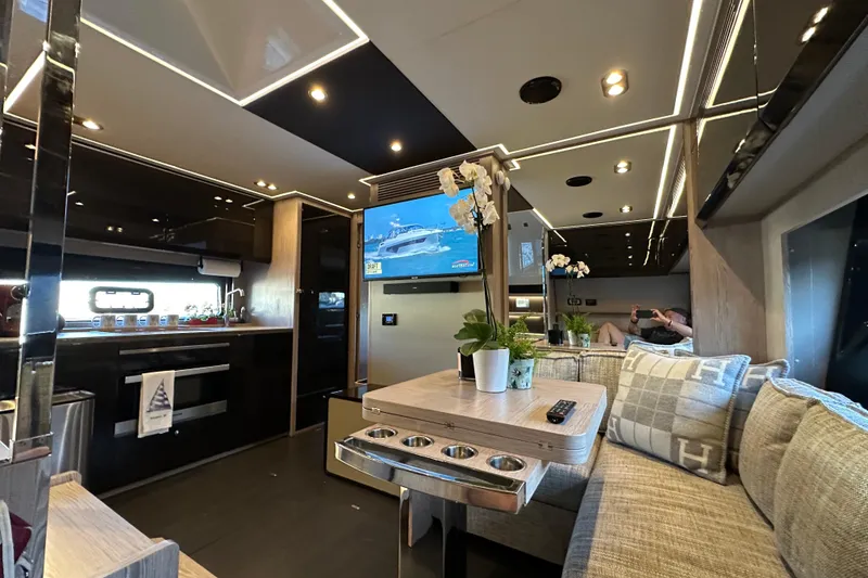 Slide: The Image of Luxurious interior of 2019 Azimut Atlantis 51 yacht with modern kitchen and cozy seating area. - 21