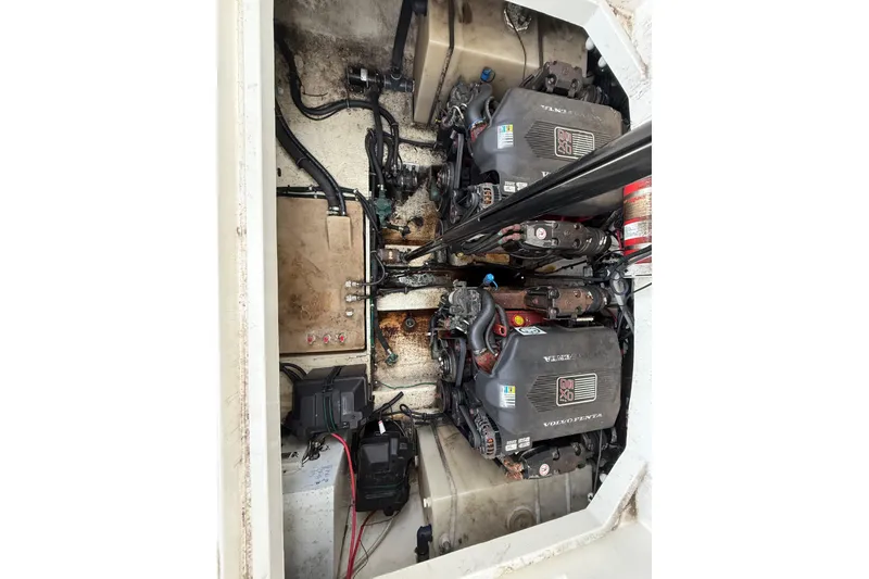 Slide: The Image of Engine compartment of a 2005 Larson Cabrio 290 boat with dual Volvo Penta engines. - 45