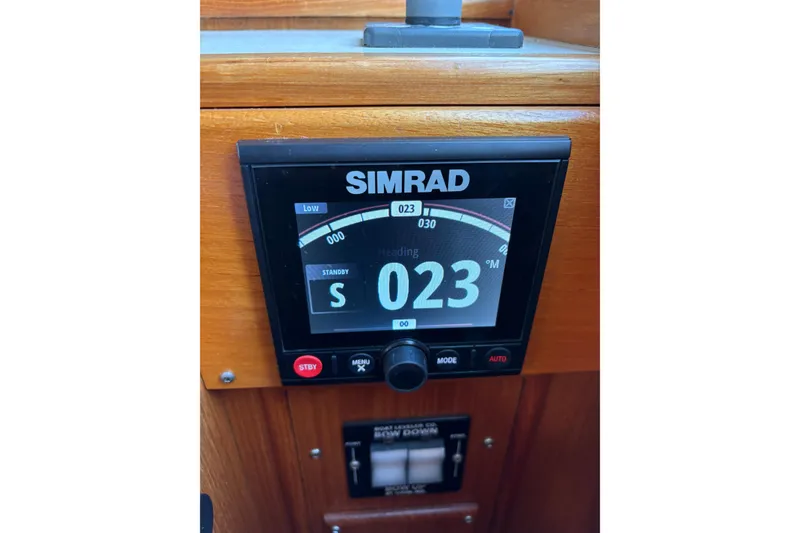 Slide: The Image of Simrad navigation display on 1995 Grand Banks 42 Motoryacht dashboard. - 26