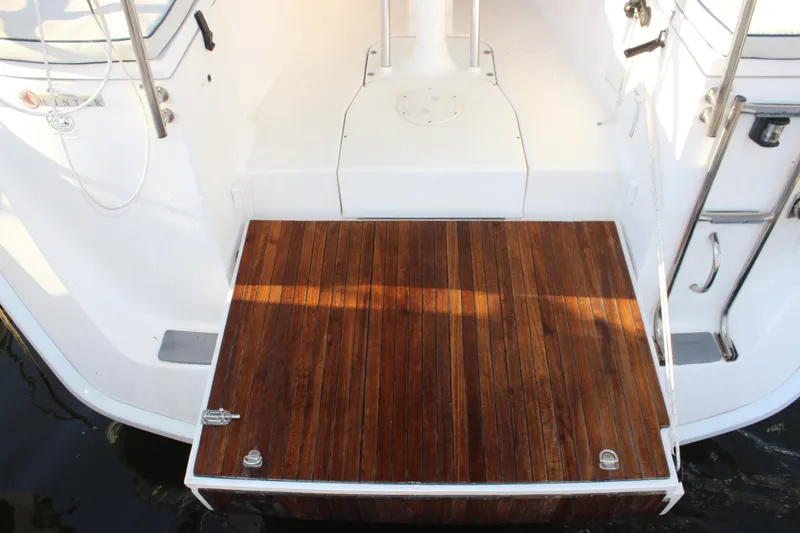 Slide: The Image of Hunter 33 sailboat stern with teak swim platform, 2014 model. - 17
