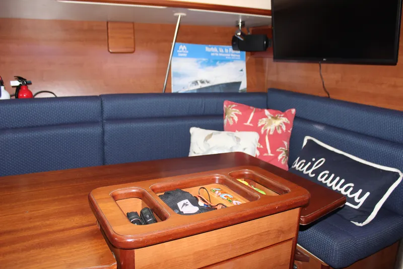 Slide: The Image of Interior of 2014 Hunter 33 sailboat with cozy seating and nautical decor. - 47