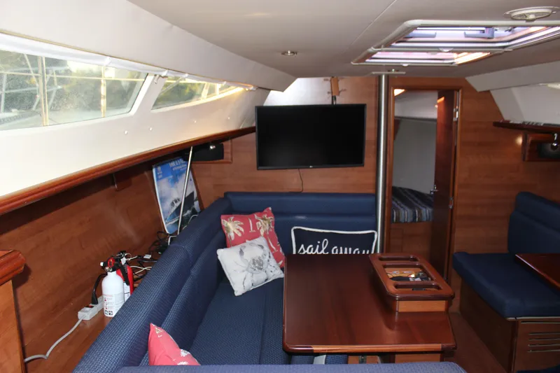 Slide: The Image of Interior of 2014 Hunter 33 sailboat with cozy seating and modern amenities. - 51