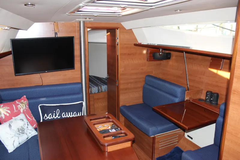 Slide: The Image of Interior of 2014 Hunter 33 sailboat with cozy seating and modern amenities. - 53