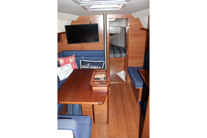 Slide: The Image of Interior of 2014 Hunter 33 sailboat with cozy seating and modern amenities. - 54