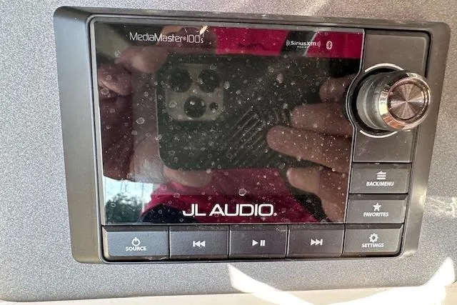 Slide: The Image of JL Audio MediaMaster 100S control panel on 2021 Harris Solstice 230 boat. - 18