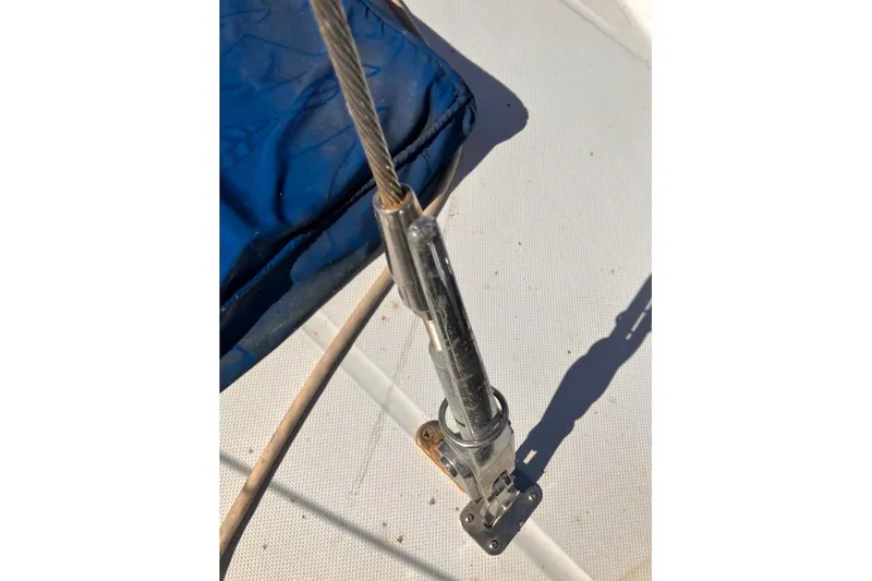 Slide: The Image of Close-up of a 1981 Valiant Cutter sailboat rigging detail on deck. - 12