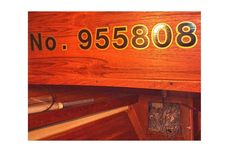 Slide: The Image of 1981 Valiant Cutter boat interior with registration number 955808 on wooden panel. - 46