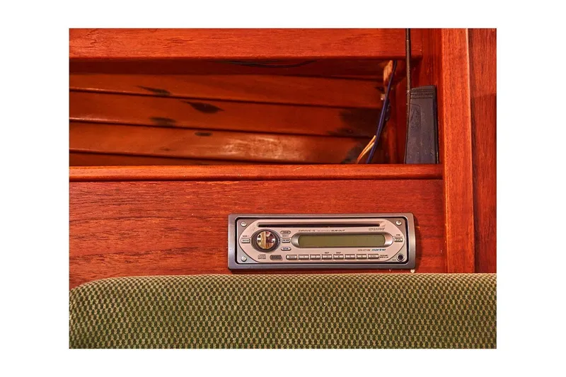 Slide: The Image of 1981 Valiant Cutter interior with vintage stereo system and wooden paneling. - 69