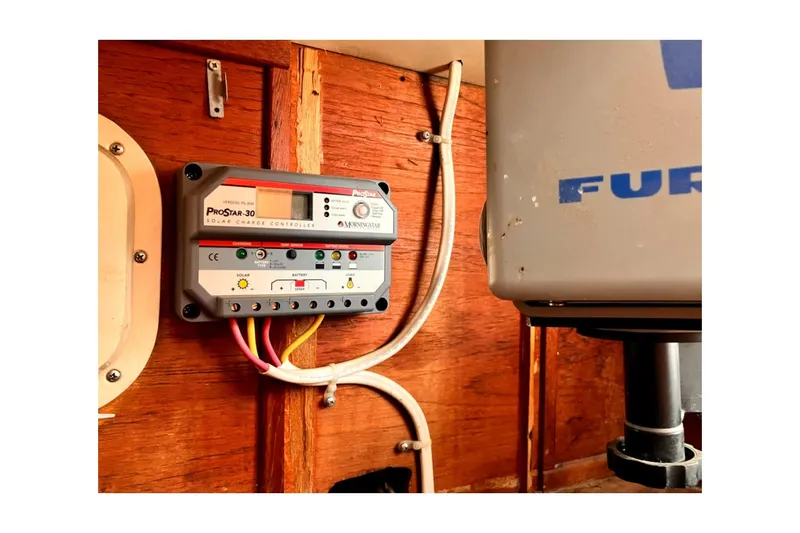 Slide: The Image of ProStar-30 solar charge controller in 1981 Valiant Cutter boat interior. - 76