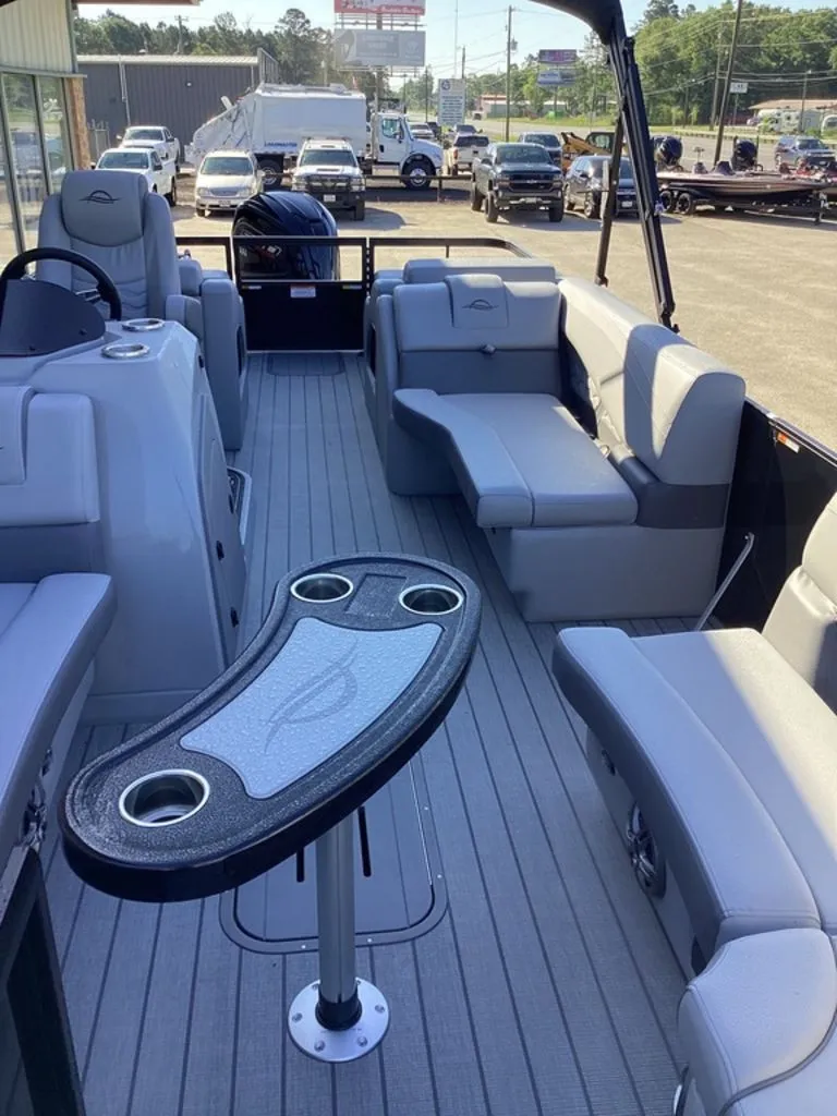 Slide: The Image of Interior view of SunCatcher Fusion 324SS boat, model year 2026. - 16
