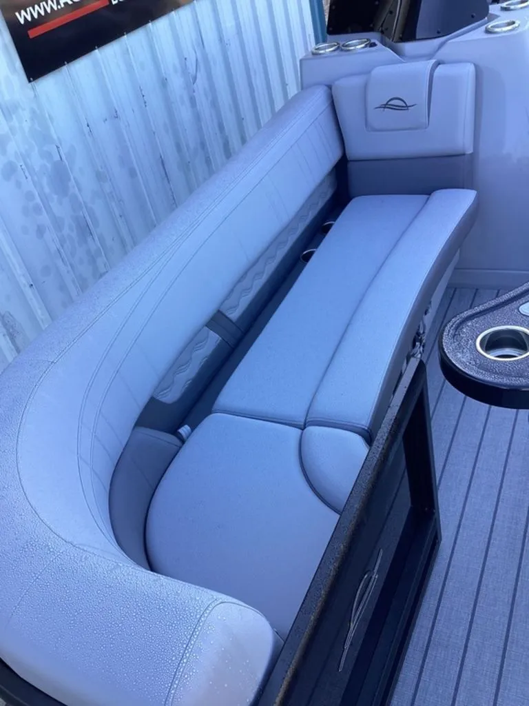 Slide: The Image of Interior of SunCatcher Fusion 324SS 2026 with gray seating area. - 17