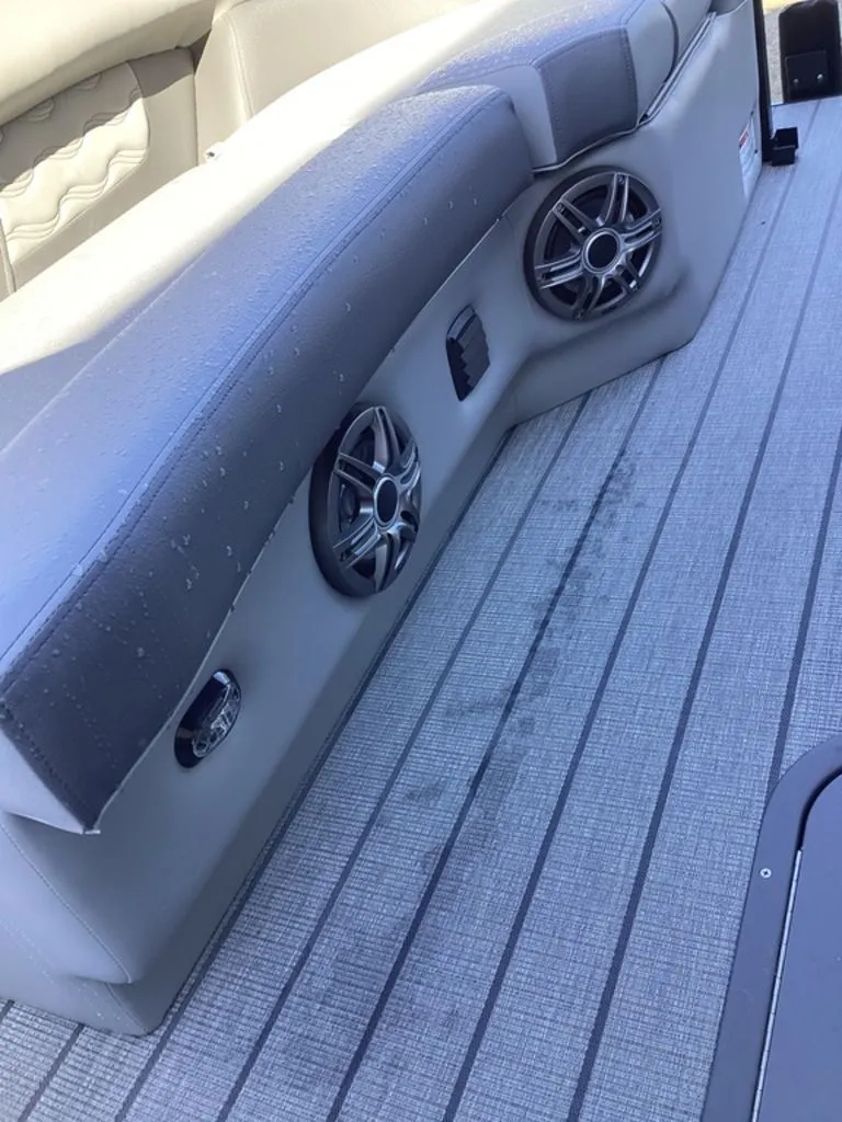 Slide: The Image of SunCatcher Fusion 324SS 2026 with speakers and grey upholstery. - 26