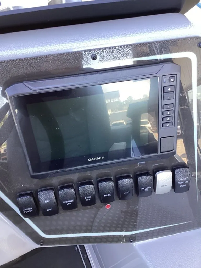 Slide: The Image of Garmin display and switches in SunCatcher Fusion 324SS, year 2026. - 39