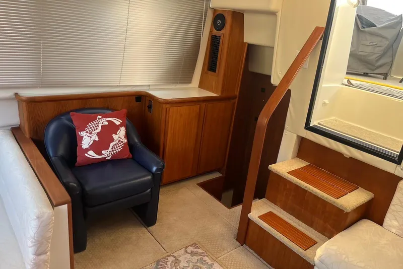 Slide: The Image of Interior of 1993 Carver 350 Aft Cabin Motor Yacht with chair and stairs. - 20