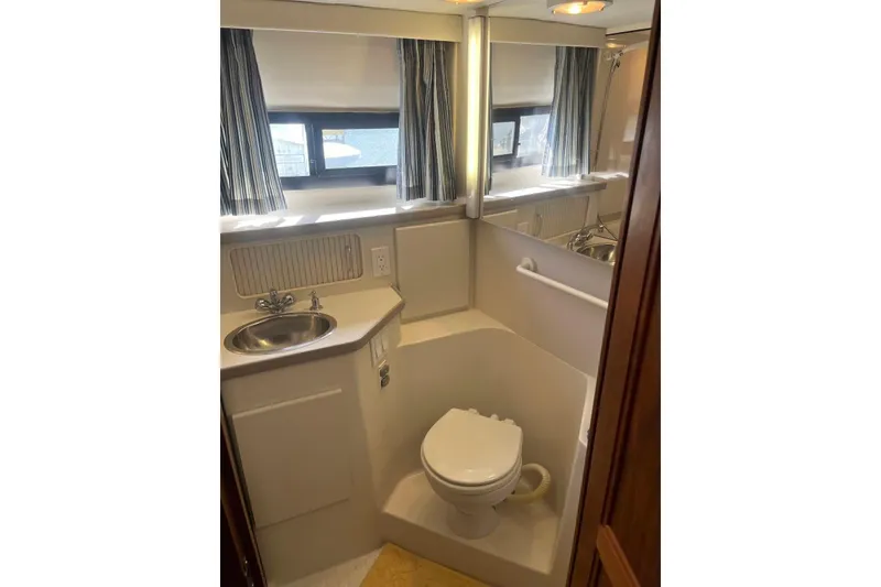 Slide: The Image of Bathroom interior of 1993 Carver 350 Aft Cabin Motor Yacht with sink and toilet. - 30