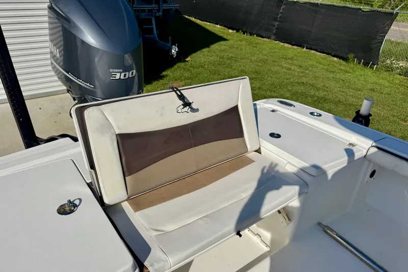 Slide: The Image of 2017 Crevalle 26 Bay boat with Yamaha 300 engine, featuring a cushioned seat. - 16