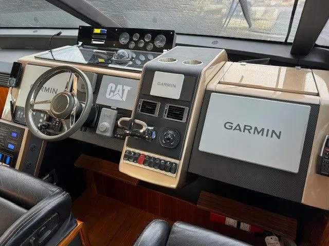 Slide: The Image of 2011 Fairline Squadron 65 yacht interior with skylight and cozy bed. - 10