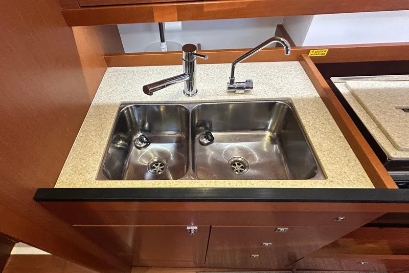 Slide: The Image of Stainless steel double sink in 2014 Beneteau Oceanis 41 yacht kitchen. - 23