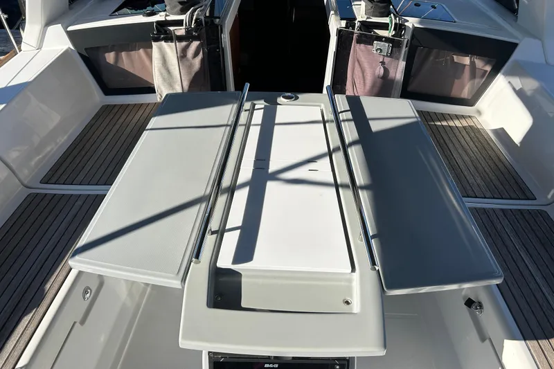 Slide: The Image of 2014 Beneteau Oceanis 41 yacht cockpit with foldable table and seating. - 28