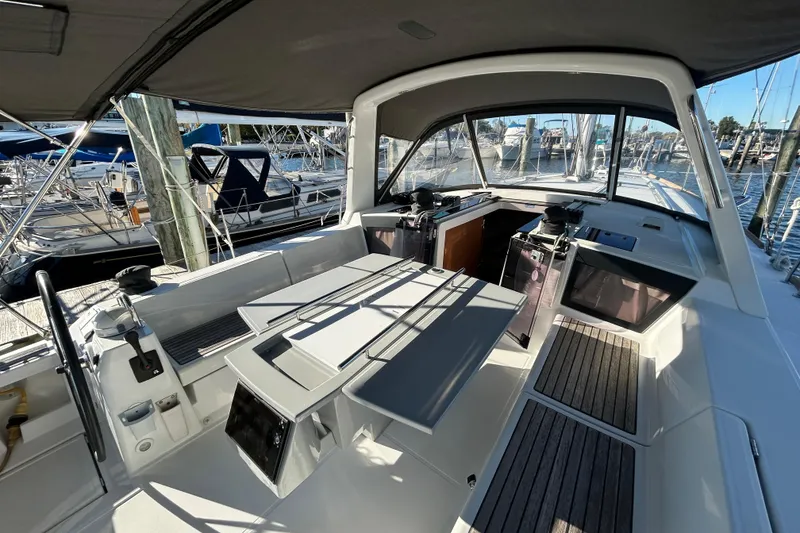 Slide: The Image of 2014 Beneteau Oceanis 41 yacht cockpit with seating and navigation equipment. - 29