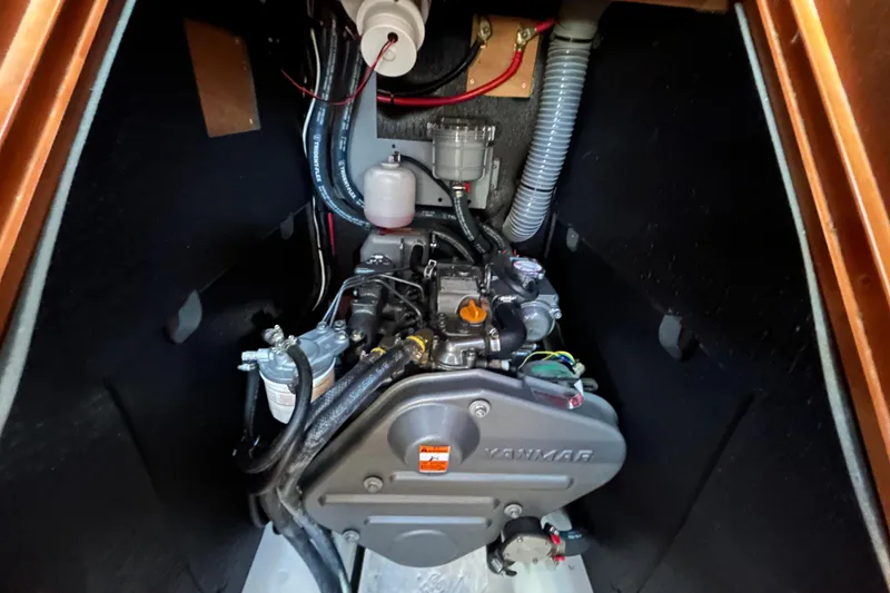 Slide: The Image of Engine compartment of 2014 Beneteau Oceanis 41 sailboat, featuring a Yanmar engine. - 40