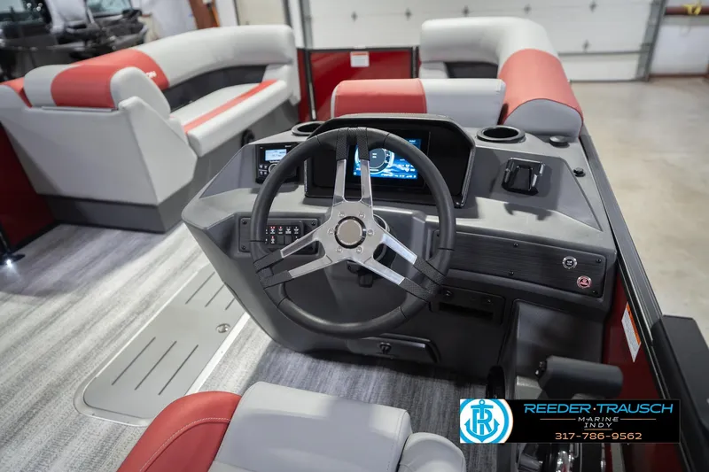 Slide: The Image of Interior of 2026 Bennington 22 SLJ boat with modern steering console and seating. - 31