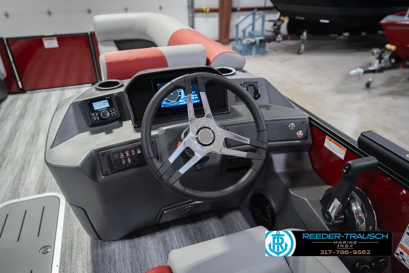 Slide: The Image of Steering console of 2026 Bennington 22 SLJ boat with modern controls and dashboard. - 32