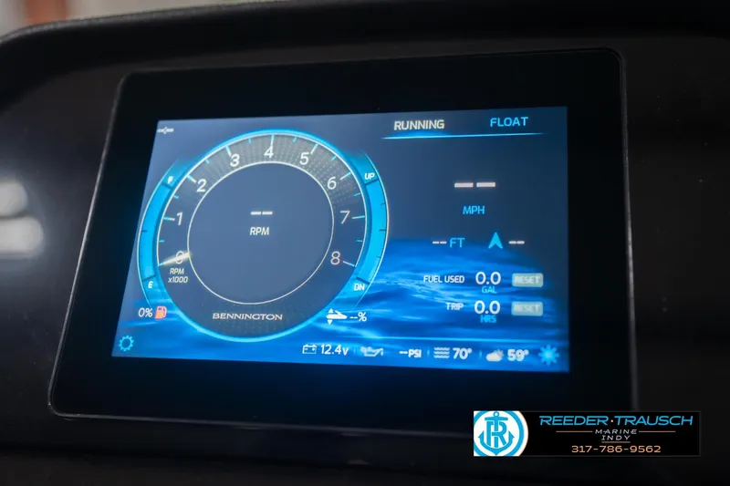 Slide: The Image of Digital dashboard of 2026 Bennington 22 SLJ boat displaying RPM and fuel data. - 36